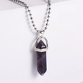 Macro detail of hexagonal amethyst pendant with silver mount and stainless steel ball chain - Amethyst Style