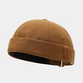 Detailed close-up of brown canvas docker hat with premium stitched leather logo label - Adjustable / Vertical Letter Patch Khaki