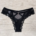 Sexy black lace thong with polka dot mesh, crossover straps and a golden heart ring - M / Black