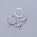Macro shot of S925 sterling silver dragonfly hoop earrings with sparkling zircon wings - Dragonfly - Silver