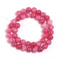 Macro detail of vibrant deep pink cracked glass beads for DIY jewelry making - Deep Pink Floral Round Bead