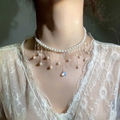 Elegant gold-plated pearl choker featuring fringe tassels and a shimmering moonstone - 12# Necklace - Pearl Tassel Vintage Style
