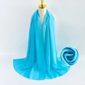 Elegant solid blue pearl chiffon scarf shown on a mannequin with texture detail - Blue