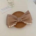 Elegant large beige satin bow hair claw clip decorated with white pearls on wooden tray - Bean Paste Pearl Bow Duckbill Clip