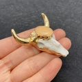 Handheld bull skull pendant featuring white resin and pink crystal stone inlay - No. 8 - Pink Round Stone