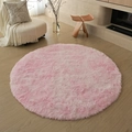 Plush round pink area rug with long pile texture for cozy bedroom or living room decor - Tie-Dye Pastel Pink