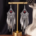 Close-up of Bohemian tassel earrings with silver chains and red bead accents - S4294-1 Red Rhombus Fringe Earrings