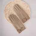 Detailed close-up of camel suede gloves featuring elegant gold metal buckle decoration - Khaki