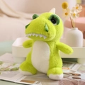 Peluche di dinosauro T-Rex verde con pancia bianca e denti aguzzi, seduto sul tavolo - 25-28cm / verde chiaro
