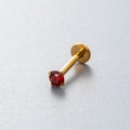 Titanium push-in labret stud in golden finish with a round red zircon gemstone - Gold-Red Zirconia