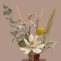 Dried flower bouquet with sola flowers and orange reed sticks in a brown glass bottle - White Flower Wheat
