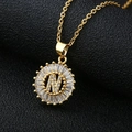Macro shot of letter N pendant with cubic zirconia and gold plated stainless steel chain - Gold Letter N