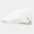 Detail view of white PU leather flat cap showing bronze buckle and fine stitching - Adjustable / White
