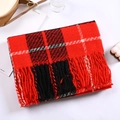 Classic red plaid cashmere-like scarf with soft fringe tassels on a minimalist background - Bright Red Plaid
