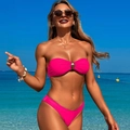 Close-up of rose pink bikini top with central oval metal buckle and high-elastic fabric - Magenta Bikini