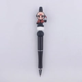 Macro detail of beadable pen with cartoon hockey mask figure and black ink refill - Masked Killer
