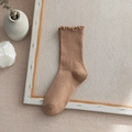 Brown cotton mid-calf socks with elegant ruffle cuffs for women, minimalist flat lay - One Size / Light Coffee