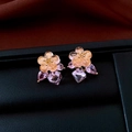 Macro shot of light orange floral earrings with purple crystal pendants on black leather - 10# Silver Earring Post - Gold - Pink - Resin Flower Purple Crystal