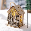 Lighted wooden Christmas cabin with reindeer carving and warm LED glow, 10cm height - Large Cabin Spotted Deer