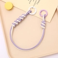 Detail of hand-woven bicolor faux leather bag strap in purple and cream with metal rings - Braided Leather Hand Chain (K4040) / Purple + White