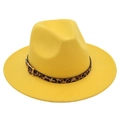 Detail of yellow fedora hat featuring a leopard print belt and golden square buckle - Yellow