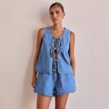 Blue denim two-piece set featuring a sleeveless bow-tie top and matching high-waisted shorts - Light Blue Set