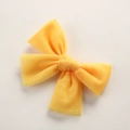 Detail of yellow tulle bow hair clip for girls with lightweight mesh fabric texture - 10.5*7.5 CM / Yellow