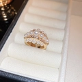 Macro shot of 18K gold plated multi-layer ring with pearls and zircons in a jewelry box - Triple Layer Pearl Zirconia Ring (25#)