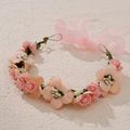 Close-up of pink artificial rose headband with green leaves and pink ribbon bow detail - Pink Series Style (HS-J4431P)