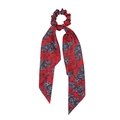 Detail of red silk ponytail scrunchie with blue and white paisley print on white background - Red Paisley