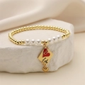 Bracciale a sfere dorate con perle e ciondolo a cuore rosso I DO su pietra - Stile Etichetta Busta I Do