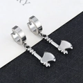 Close-up of silver axe pendant earrings with polished finish and round clicker hoops - Axe - Steel