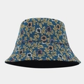Detail of high-density jacquard fabric on navy blue bucket hat with yellow leaf patterns - One Size / Navy Blue