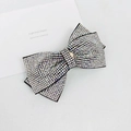 Macro detail of sparkling AB rhinestone bow hair clip with layered shimmering crystal design - 8cm Medium Cross Flat Waist Gradient White