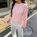 Pink cable knit sweater and white trousers in a casual street style outdoor look - S / Pink