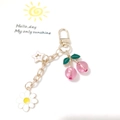 Pink cherry keychain accessory with golden leaf daisy and star charm detail - Pink Cherry with Star and Flower Charm (Cherry A-I)