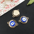 Golden evil eye connector with blue enamel and sparkling rhinestones for DIY jewelry - KC Gold - Round Evil Eye Connector - 17x12mm