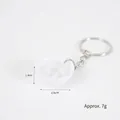 Miniature white rice bowl keychain with realistic texture and silver metal ring accessory - Keychain style