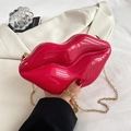 Unique rose red lip shaped acrylic clutch bag with a sleek gold chain strap - Red