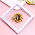 Golden sunflower brooch with bee accent and crystals in white presentation frame - XZ151-Sunflower Bee-Boxed
