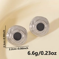 Dettaglio macro degli orecchini geometrici a spirale argento con smalto nero e dimensioni - Argento Nero