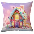 Detail der weichen Weihnachts-Kissenhülle mit rosa Lebkuchenhaus-Druck für das Sofa - Winter Lebkuchenhaus