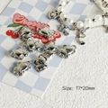 Detail of silver elephant metal pendant for DIY jewelry, measuring 17 by 20 mm - Style 20 Elephant