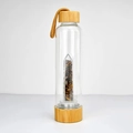 Bamboo lid glass water bottle with internal crystal pillar and dark crushed gravel - Tiger Eye Stone Bracelet