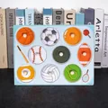 Educational wooden peg puzzle for kids featuring colorful sports balls and easy-grip handles - A015 Ball Sports Recognition