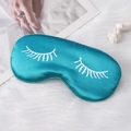 Teal green satin sleep eye mask with white eyelash print on soft white plush - Green