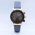 Detailed view of the quartz watch's sunray dial with decorative sub-dials and leather strap - Gold Case with Dark Grey Strap