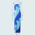Detail van een strapless maxi-jurk met blauw en turkoois kleurverloop en zijsplit - S / Blauw
