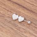 White heart-shaped shell bead with golden letter V and pearl detail on silver pin - Letter V