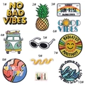Detail view of ten assorted cartoon planet and retro theme embroidery patches for clothes - Mixed Embroidery Patch Set (10 Styles) with Sewing Kit